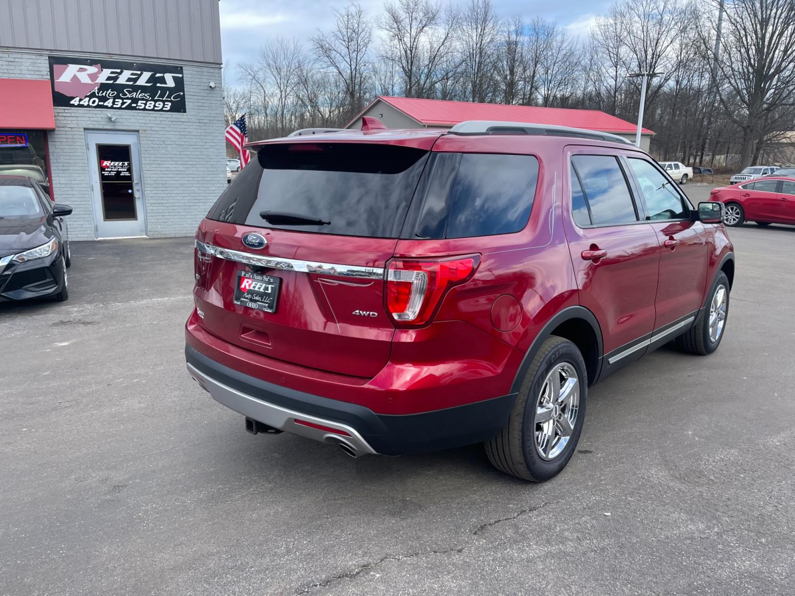2016 Red /Black Ford Explorer XLT 4WD (1FM5K8D87GG) with an 3.5L V6 DOHC 24V engine, 6 Speed Automatic transmission, located at 547 E. Main St., Orwell, OH, 44076, (440) 437-5893, 41.535435, -80.847855 - This 2016 Ford Explorer XLT 4WD, equipped with a 6-speed automatic transmission and a 3.5-liter V6 engine, stands out with its notable towing capacity of up to 5000 pounds, making it a robust choice for towing and adventure needs. The vehicle enhances visibility and safety with LED daytime running l - Photo #7
